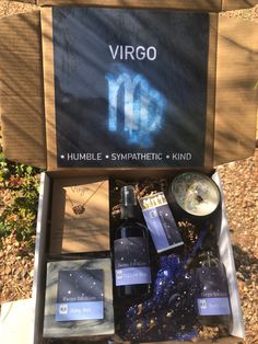 an open box containing various items from the virgo collection