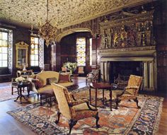 an ornately decorated living room with high ceilings