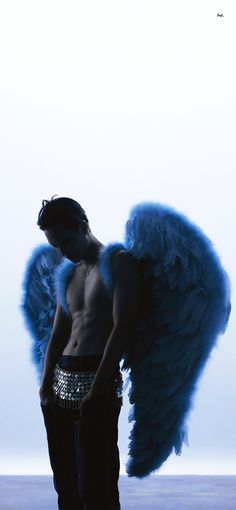 a man with an angel wings on his back