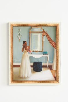 a woman in a white dress standing next to a giraffe and a mirror