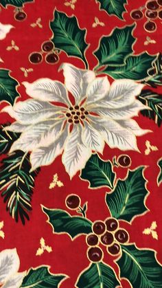 a red background with white flowers and green leaves on the bottom right corner is an image of holly, berries, and pine cones