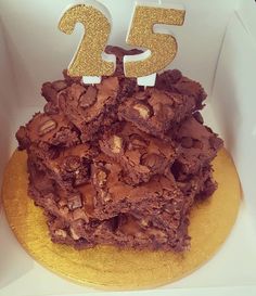 a brownie cake with the number twenty five on top