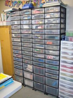 a room filled with lots of plastic drawers