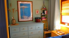 a bedroom scene with focus on the dresser