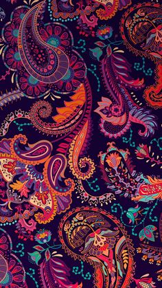 an image of a colorful paisley pattern on a dark blue background with red, orange and pink colors