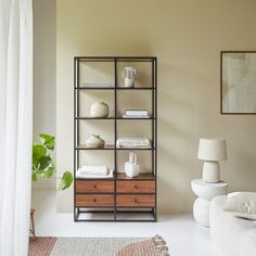 a living room filled with furniture and decor