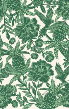 a green and white wallpaper with flowers on it