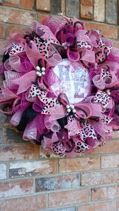 Handmade Deco Mesh Breast Cancer Awareness Wreath with beautiful colors of pink and black base with embellishments of quality wired ribbon tails pink and black Leppard print and light pink.Flex tubing pink and black with white berriesand the metal sign Gnome that says Hope for the front door, home decor or a gift for a loved one.  Put a little love in your cart for it is time to decorate to welcome friends and family.  This seasonal wreath is ready to ship and freight is determined by your zip code, the weight and the size of your box. If you do not have an account you can also shop as a Guest. Once you complete your order be sure to take a moment to verify your order to make sure your address is correct , Please be aware that I can not ship to P.O. boxes.  Verify your card number, expirat Baby Wreath For Hospital Door, Front Door Pink, Awareness Wreath, Baby Wreath, Hospital Door, Month Of October, Seasonal Wreaths, Wired Ribbon, Zip Code