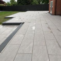 an empty patio with steps leading up to it