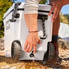 The Coleman Convoy Series Cooler is made for day trips, long-haul adventures, and everything in between. The heavy-duty Convoy 65-Quart Cooler with Wheels can hold enough drinks for everyone, making it a hit at campsites and tailgates. The TempLock FX fully insulated lid and body and heavy-duty latch keep drinks cold, and the stainless steel hardware is made to last. Getting from the car to the campsite or tailgate is easy with a metal handle, heavy-duty wheels, and nonslip-grip rope handles. Wh Cooler With Wheels, Portable Party, Ice Making, Ice Cold Drink, Snowboard Bag, Portable Cooler, Whitewater Kayaking, Cold Prevention, Sleeping Pads