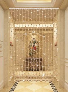 a hallway with a chandelier and rug in it