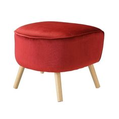 a red foot stool with wooden legs on an isolated white background for use in interior and exterior design