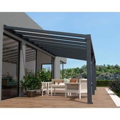 an outdoor patio with furniture and plants on the deck