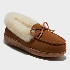 Meet the ultimate comfort combo. With genuine suede providing soft yet durable stability alongside genuine shearling's naturally moisture-wicking, all-over comfort, our Dluxe Helene Moccasins were crafted with constant support and coziness in mind. A pair of our tried-and-true memory foam insoles add an extra touch of cloudlike comfort and cushioning. Brown Shearling Slippers With Faux Fur Lining, Cozy Brown Shearling Slippers, Casual Shearling Slip-on Slippers, Leather Slip-on Slippers With Faux Fur Lining, Shearling Slip-on Slippers With Faux Fur Lining, Suede Slippers, Clog Slippers, Decorative Bows, Rubber Shoes