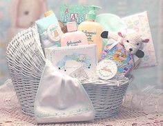 a basket filled with baby items sitting on top of a table