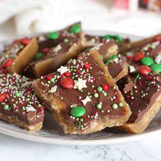 chocolate and sprinkles are arranged on a plate