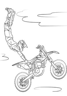 a person on a dirt bike jumping in the air with his hand up to the ground