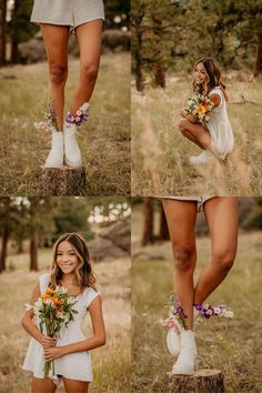 a woman in short shorts and boots holding flowers while standing on a stump with her legs crossed