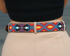 Leather beaded belt with removable Grace buckle. Ipanema design (southwestern inspired).If you don't see your size, send an email to sales@sambboho.com. We can make the belt in any sizes you want. This belt is part of our made to order collection. Estimated delivery date for made to order items is 15-20 business days (includes processing+ shipping time). Very unique and long lasting Brazilian leather belts. Fully handmade. Beautiful art pieces made of un-dyed full grain leather and Slovakian gla Women's Belts, Beaded Belt, Vogue Magazine, Bead Leather, Leather Belts, Long Pants, Belts For Women, Full Grain Leather, Beautiful Art