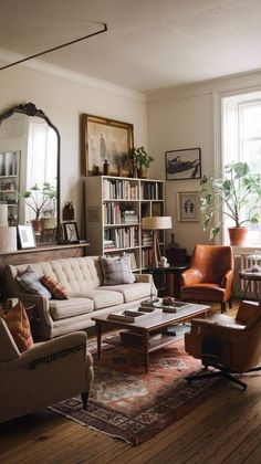 a living room filled with furniture and a large mirror