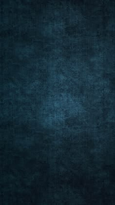 a dark blue background with some stains on it