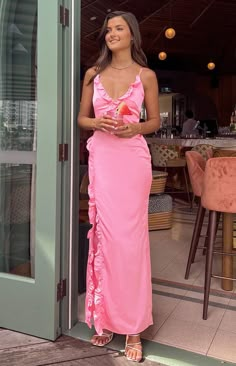 Pink Satin Ruffle Maxi Dress

How to Style:
Attention please! We have found the perfect formal () dress! This vibrant baby pink maxi dress () will make heads turn at your next event. Pair this stunning number with heels and gold dainty jewellery for that ultimate look!

Features:
  
 * Bias Cut 
 * Maxi Length 
 * V Neckline 
 * Thin Straps 
 * Adjustable Straps 
 * Leg slit (right side) 
 * Ruffle detailing Wedding Pink Dress Bridesmaid, Pink Beach Wedding Guest Dress, Ruffle Prom Dress Long, Baby Pink Dress Long, Maxi Birthday Dress, Sorority Formal Dress Long, Unique Long Dresses, June Wedding Guest Dress, Pink Satin Dress Long