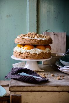 a cake sitting on top of a wooden table