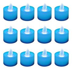 blue candles are lined up in rows on a white background