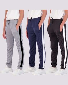 Stand Out: With our unique design, our 3-Pack of Boys' Mesh Joggers sets the bar high for activewear. The mesh fabric is breathable and allows for maximum comfort during any physical activity, giving your young athlete the competitive edge. Benefits for Your Active Boy: Whether it's for running, basketball, school, or just lounging around, these joggers are the perfect addition to any active boy's wardrobe. The mesh fabric keeps him cool and comfortable, while the cuffed ankles ensure a snug fit Sporty Activewear With Side Stripes For Sports Events, White Joggers For Training, White Activewear With Elastic Side Panels For Gym, White Activewear For Gym With Elastic Side Panels, White Gym Activewear With Elastic Side Panels, Nylon Sweatpants With Elastic Side Panels For Jogging, White Training Bottoms With Side Stripes, Athleisure Jogging Bottoms With Side Stripes, White Activewear With Elastic Side Panels For Workout