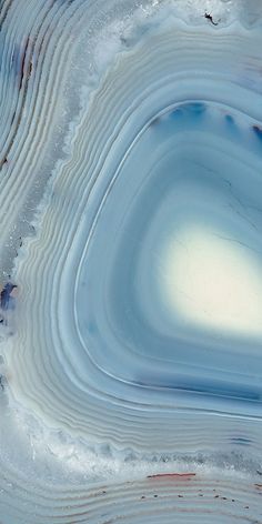 an aerial view of blue and white marble