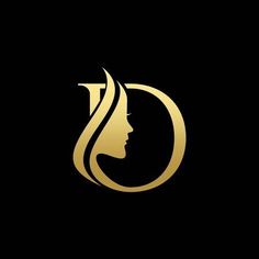 a woman's face in gold on black background