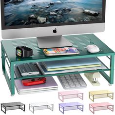 the computer desk has several different colors and sizes on it, including one with an apple monitor