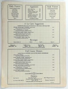 an old menu is displayed on the table