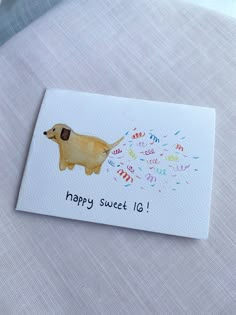 a card that says happy sweet 16 with a dog on it's back and fireworks coming out of its mouth