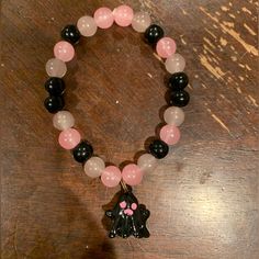 7” Before Stretch Glass Beads Hallow Black Ghost Charm 4 Matching Bracelets, Pink Jewelry With Black Beads For Gift, Casual Pink Beaded Bracelet With Large Beads, Casual Black Jewelry With Heart Beads, Pink Beaded Party Bracelets, Casual Black Beaded Bracelets With Large Beads, Casual Black Beaded Bracelet With Large Beads, Cute Black Bracelet Jewelry, Glass Bracelet Ideas