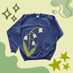 ⭐Available⭐$50- Lily of the Valley Navy Crewneck Size Large 🌷 Large Embroidery Patterns, Painting On Sweatshirts, Machine Embroidered Clothes, Cute Merch Ideas, Patchwork Diy Clothes, Sewing Projects Cute, Sewing Clothes Ideas, Diy Hoodie Design, Diy Clothing Ideas