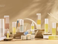 an assortment of skin care products displayed in front of a beige background with white flowers