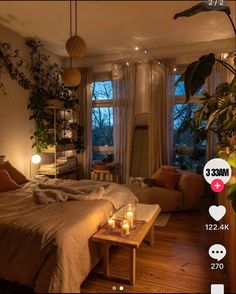 a bed room with a neatly made bed and candles