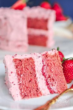 a slice of strawberry cake on a white plate