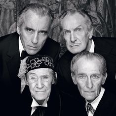 three men in suits and ties are posing for a black and white photo with an ornate wall behind them