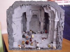 a lego star wars scene is displayed on a table