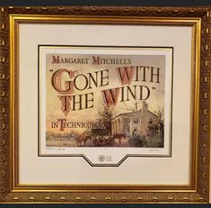 an old movie poster with the title gone with the wind in it's gold frame