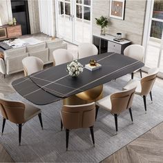 a dining room table with chairs around it