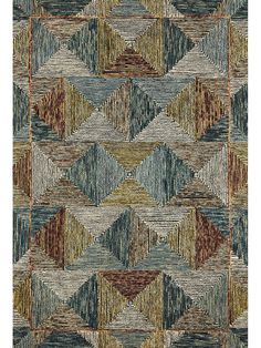 an area rug with different colors and patterns on it, including brown, blue, green,