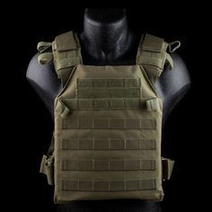 the back of a body armor on a mannequin dummy head with black background