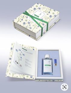 an open book with a bottle of water in it and the contents opened to show what is inside