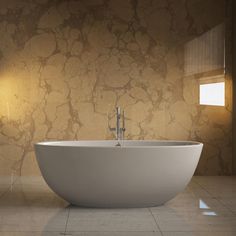 a large white bath tub sitting on top of a tiled floor