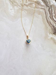 "14k Solid Gold Heart Evil Eye Necklace - 14k Gold Heart Shaped Necklace - Gold Nazar Necklace - Nazar Jewelry - Fine Jewelry for Women The Solid Gold Heart Evil Eye \"Protection\" for Women is composed of high-quality 14 Karat Gold. 14K Gold Nazar Necklace dazzles with its simple elegance. The evil eye bead destroys the bad energy of women. Evil Eye symbolizes fate protection and an open flow of communication. 🔳WARRANTY🔳 *6 Months warranty. *Free Shipping without price limit. *Easy Return and Nazar Jewelry, Nazar Necklace, Heart Evil Eye, Gold Evil Eye Necklace, Bad Energy, Gold Disc Necklace, Evil Eye Necklace Gold, Heart Shaped Necklace, Protection Necklace