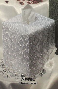 an advertisement for diamond jewelry featuring a tissue box