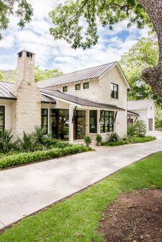 a large white house with lots of windows